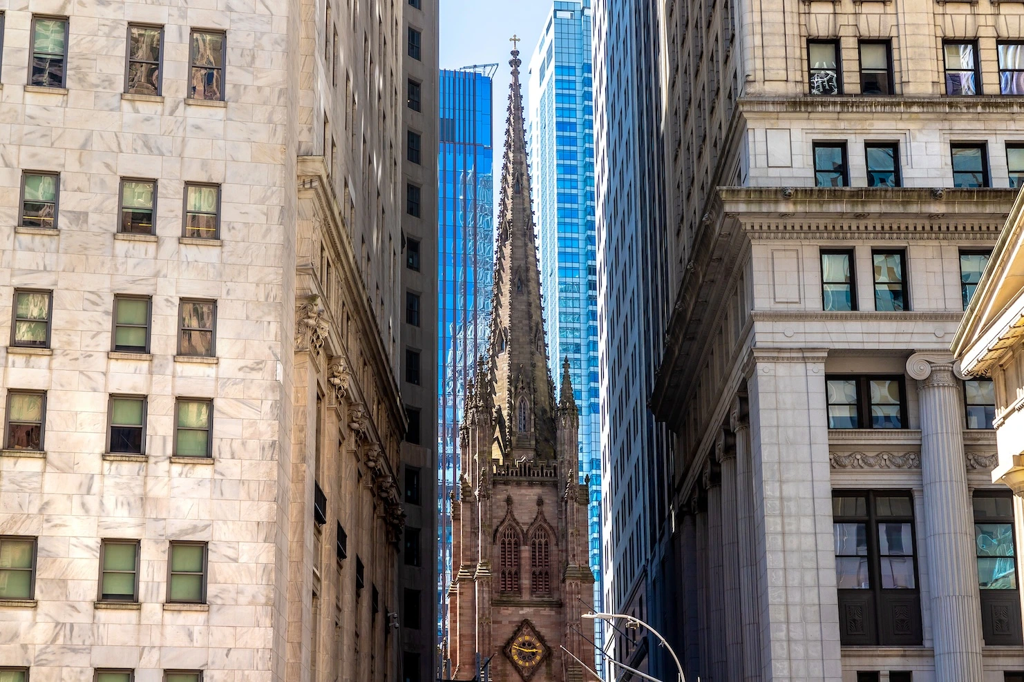 The Trinity Church amidst Modern Skyscrapers in Lower Manhattan